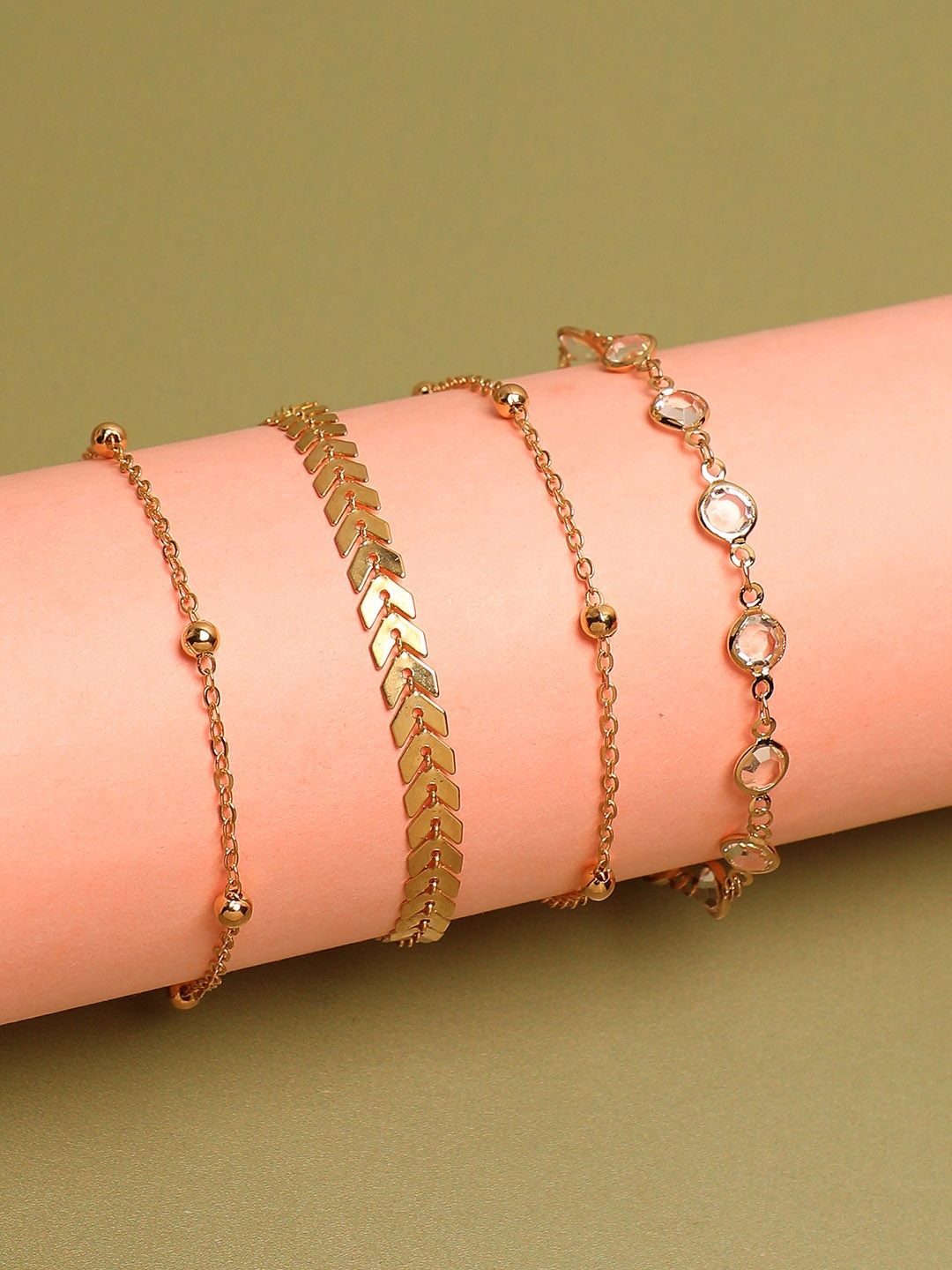 

SOHI Set of 4 Gold-Plated & Toned Anklets Cum Bracelets