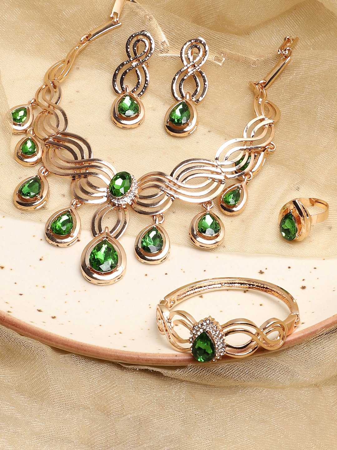 

SOHI Women Gold-Plated Green & White Stone-Studded Jewellery Set