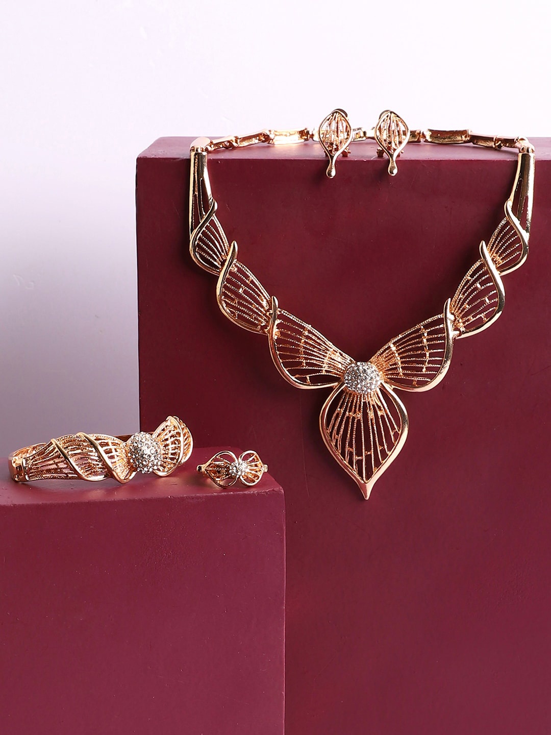 

SOHI Women Gold-Plated White Stone Studded Jewellery Set