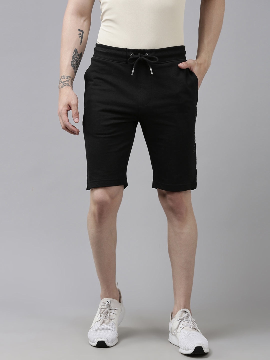 

U.S. Polo Assn. Denim Co. Men Solid Mid-Rise Knitted Shorts With Cut-Out Detail, Black