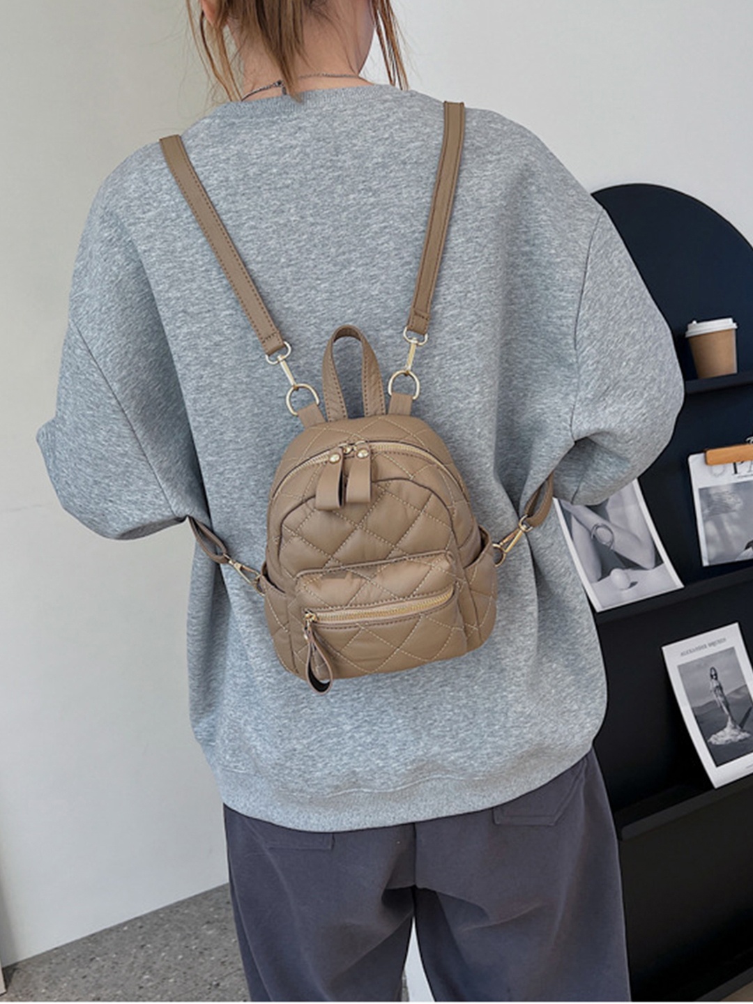 

Angeline Women Beige Solid Non-Padded Synthetic Backpack