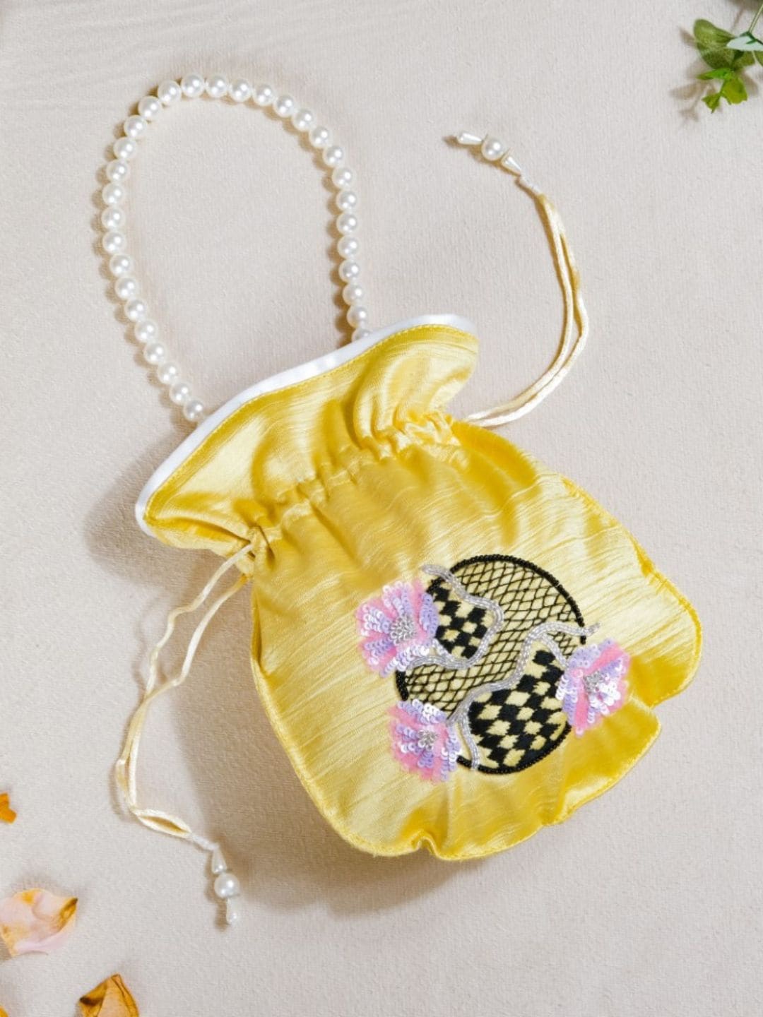 

Nestasia Women Yellow Embellished Handheld Bag