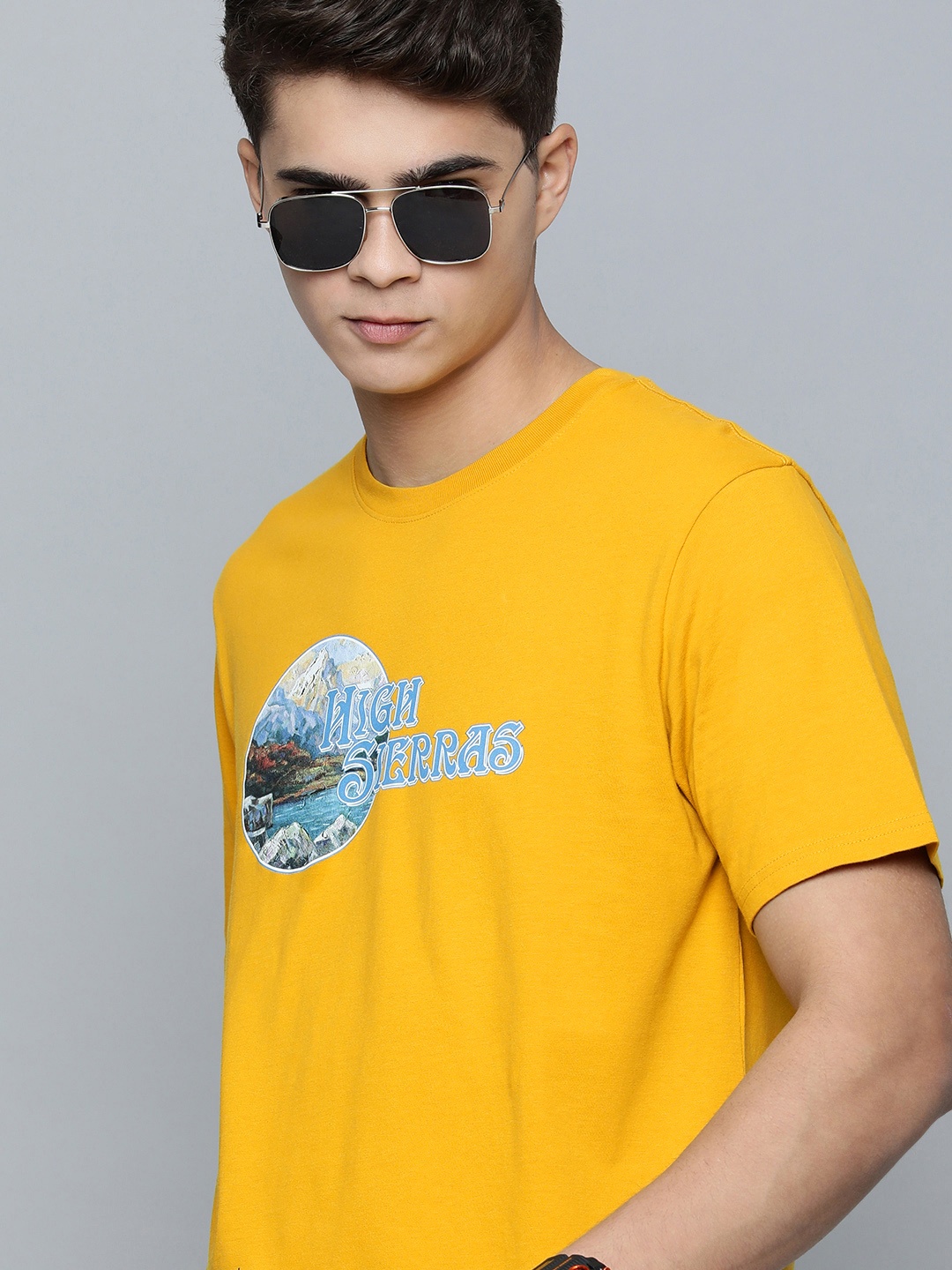 

Levis Men Mustard Yellow Relaxed Fit Graphic Printed Pure Cotton T-shirt