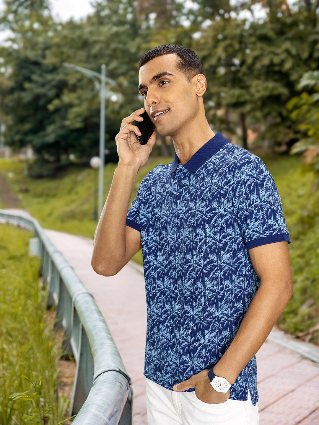 

Levis Men Pure Cotton Tropical Printed Polo Collar T-shirt, Blue