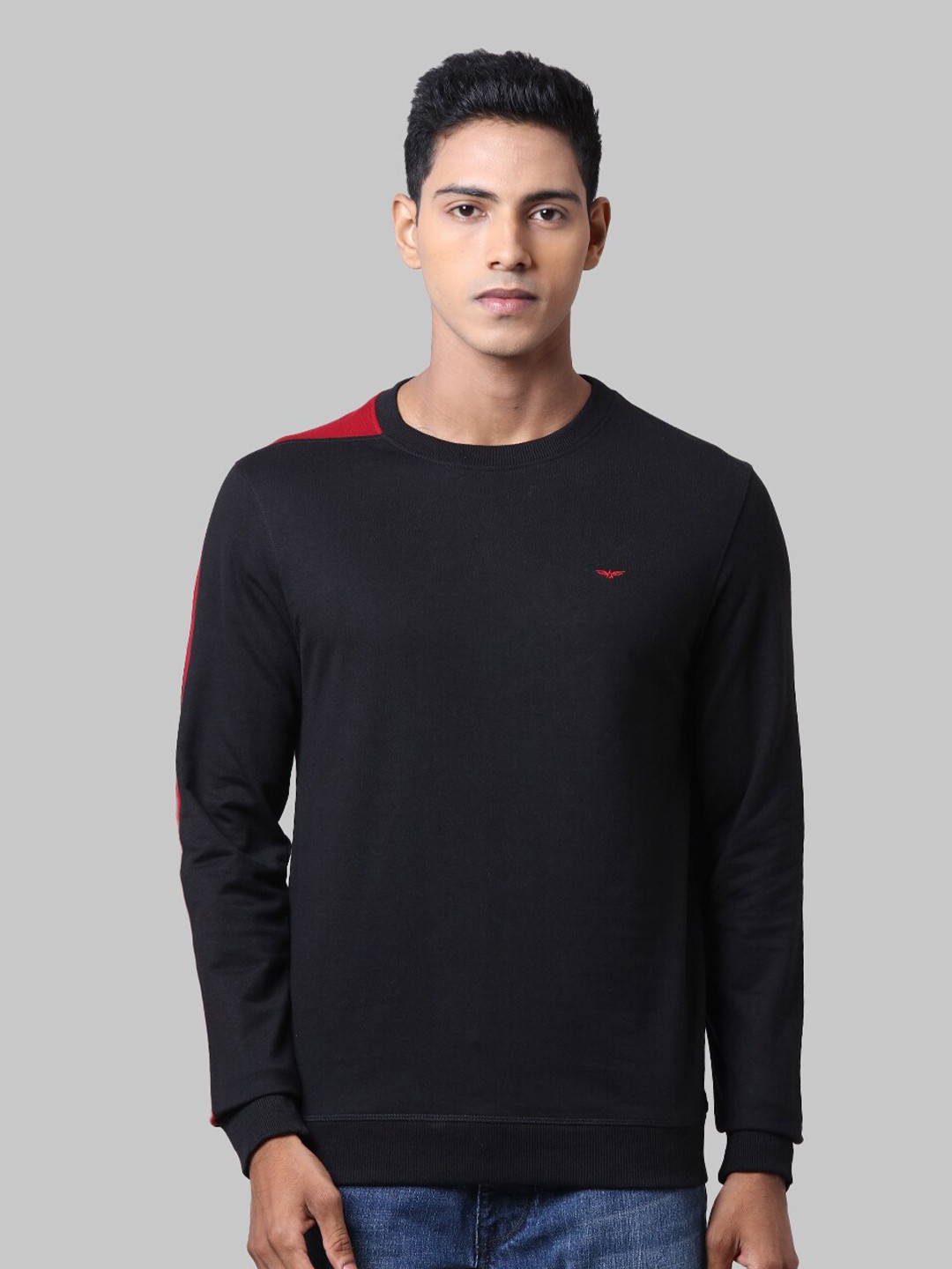 

Park Avenue Men Black Solid Sweatshirt