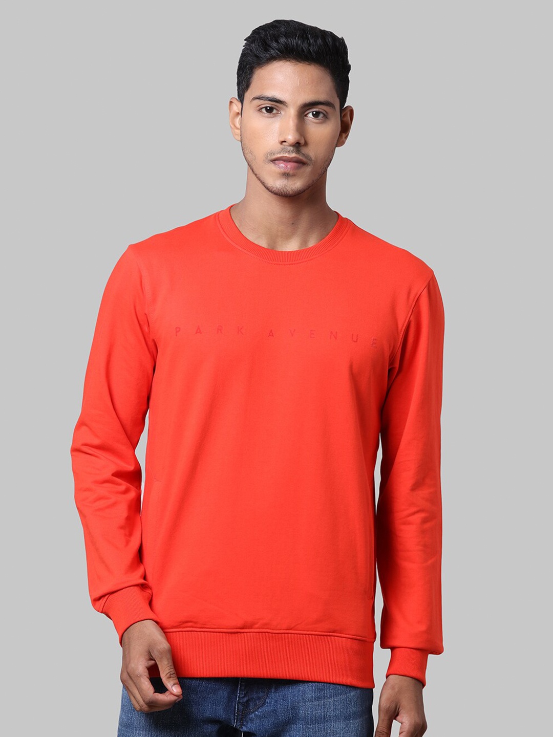 

Park Avenue Men Orange Solid Round Neck Cotton Sweatshirt