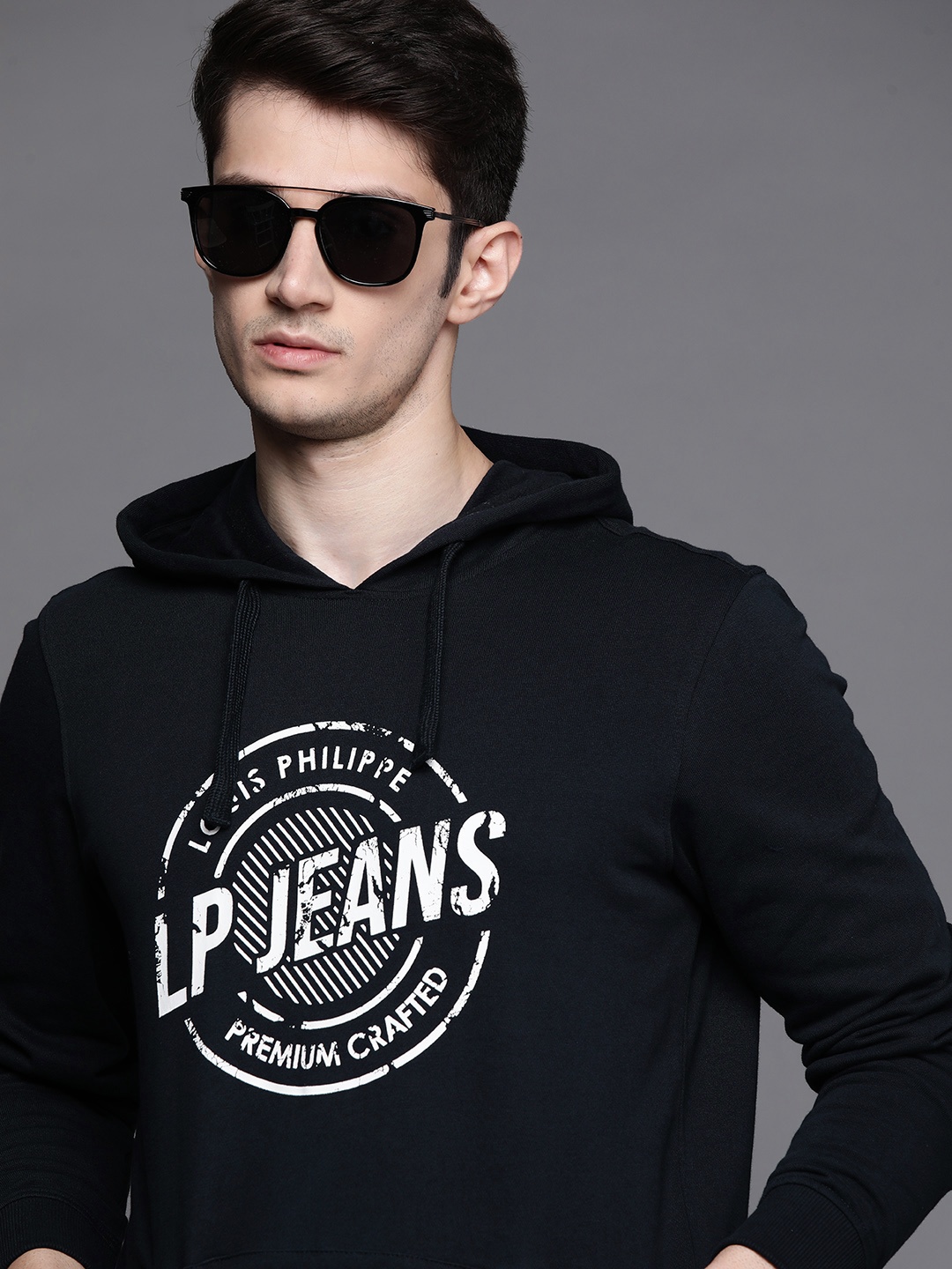 

Louis Philippe Jeans Men Navy Blue & White Printed Hooded Sweatshirt