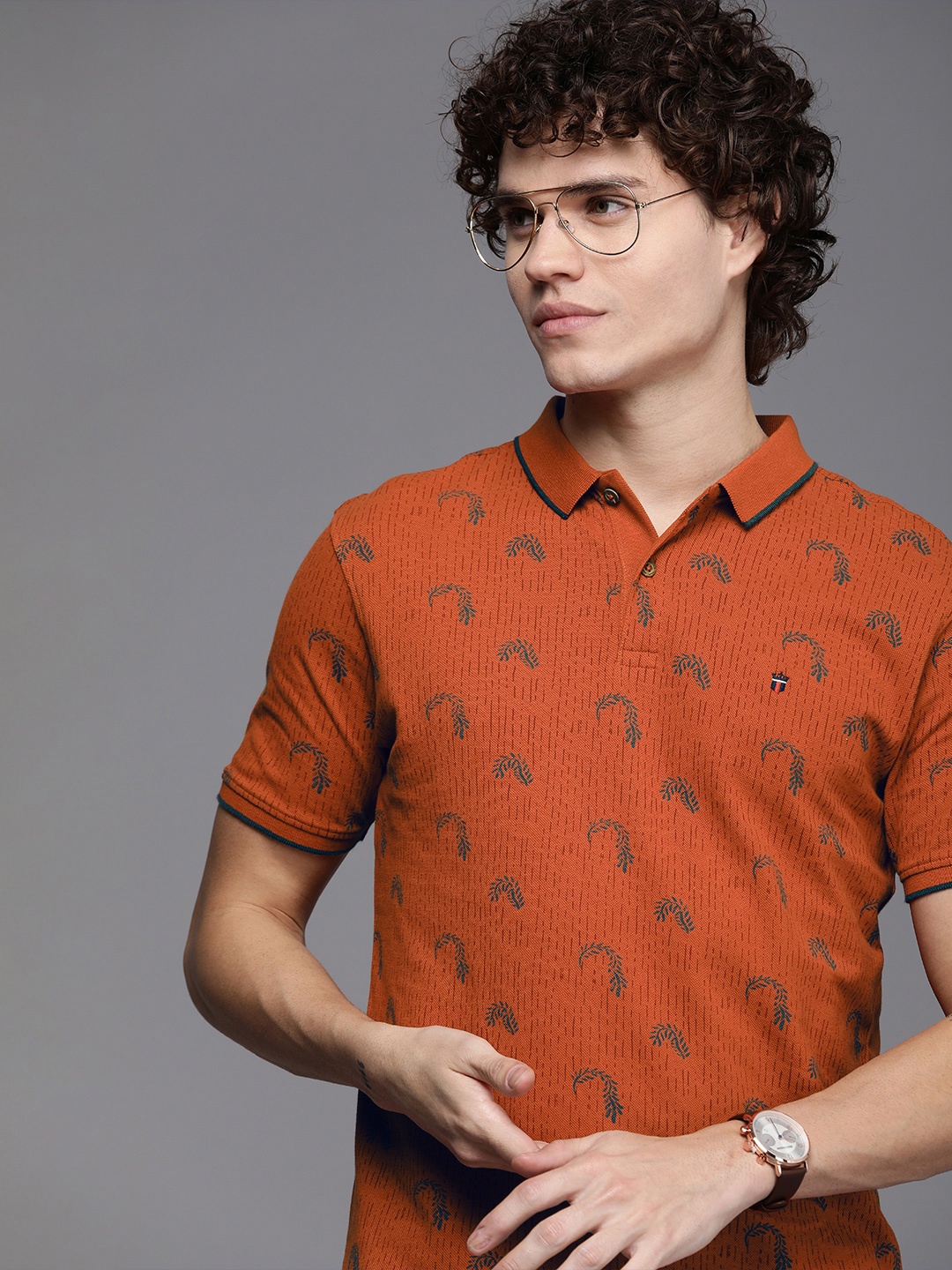 

Louis Philippe Jeans Men Tropical Printed Polo Collar Pure Cotton Slim Fit T-shirt, Rust