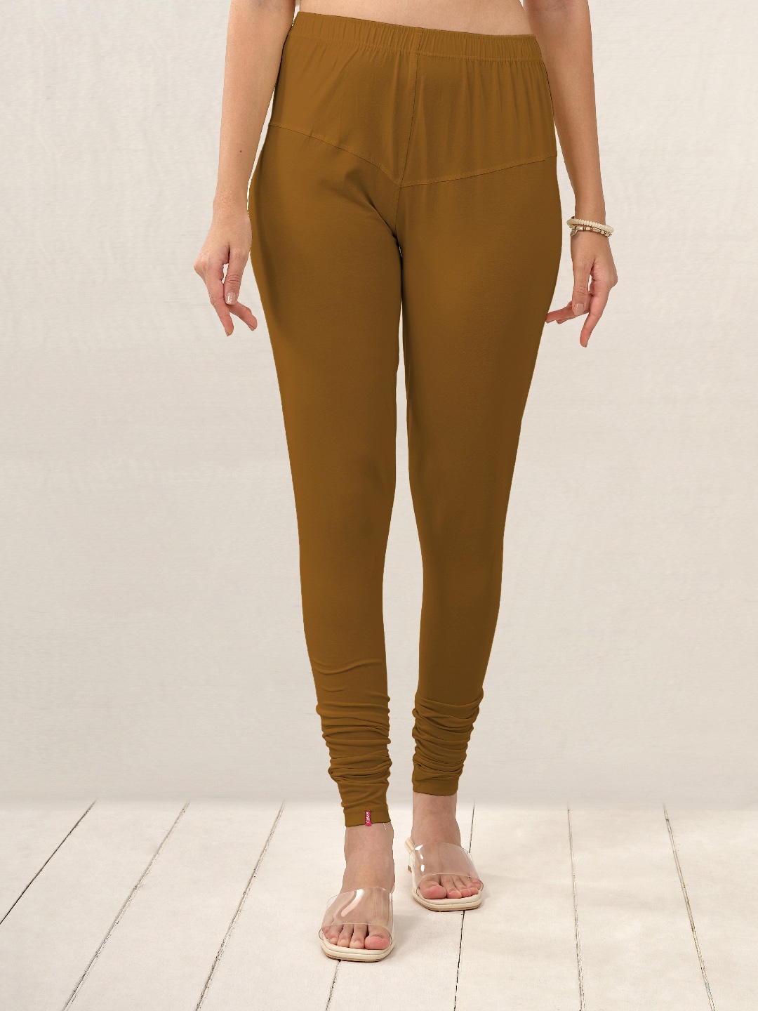 

LYRA Women Tan Brown Solid Churidar Leggings