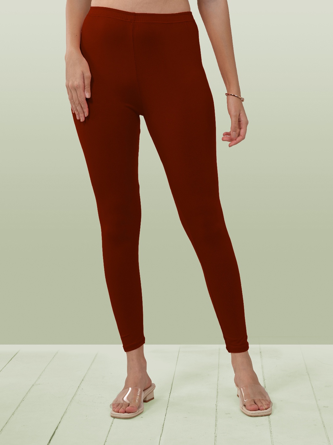 

LYRA Women Rust Red Solid Ankle-Length Leggings