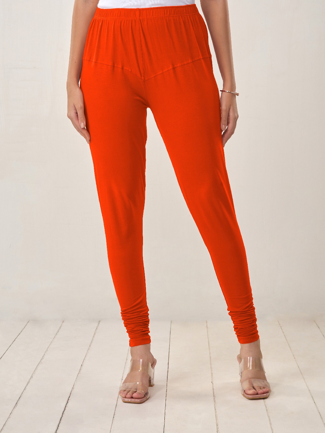 

LYRA Women Orange Solid Churidar-Length Leggings