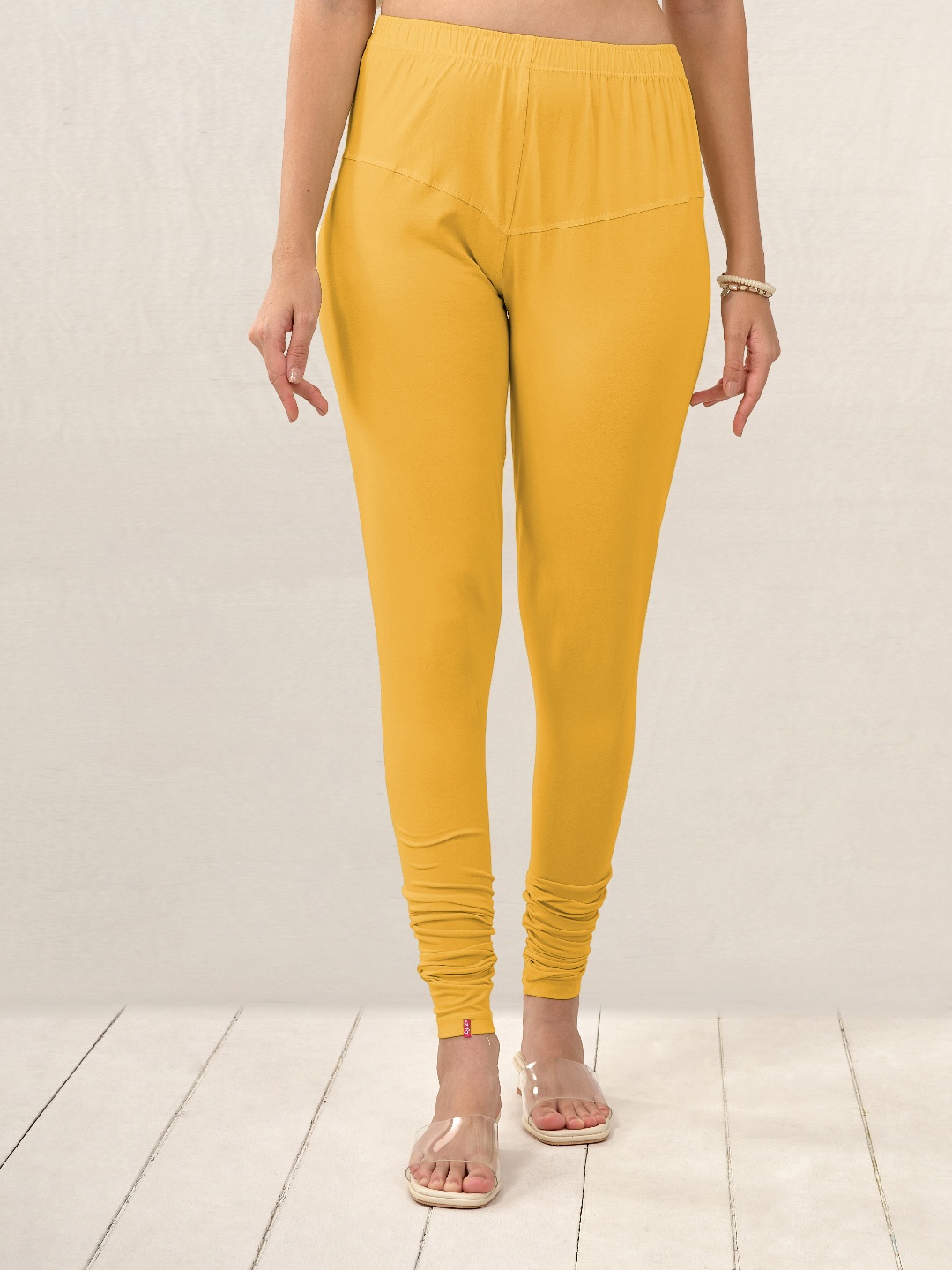 

LYRA Women Gold-Toned Solid Churidar-Length Leggings