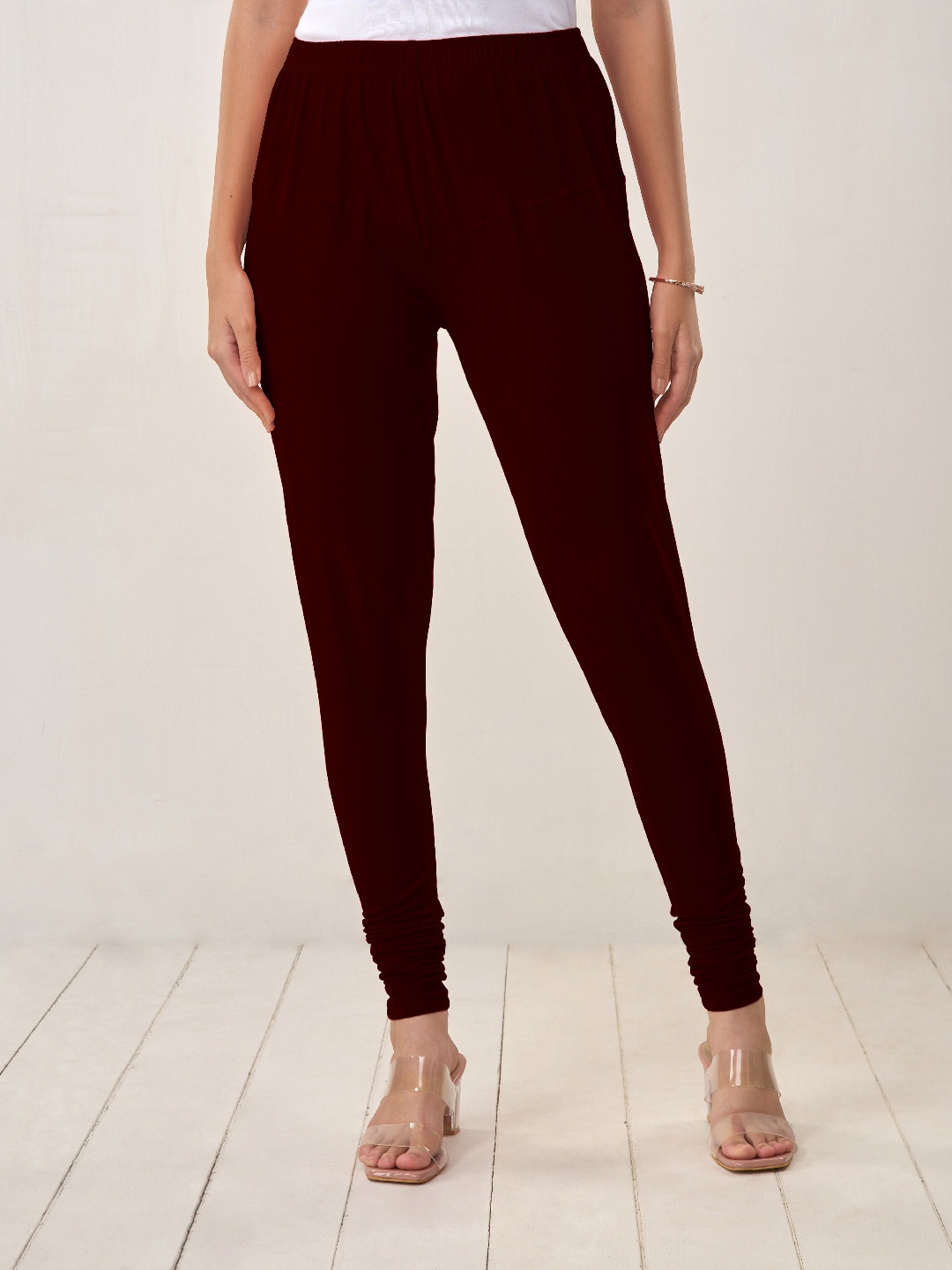 

LYRA Women Maroon Solid Churidar-Length Leggings