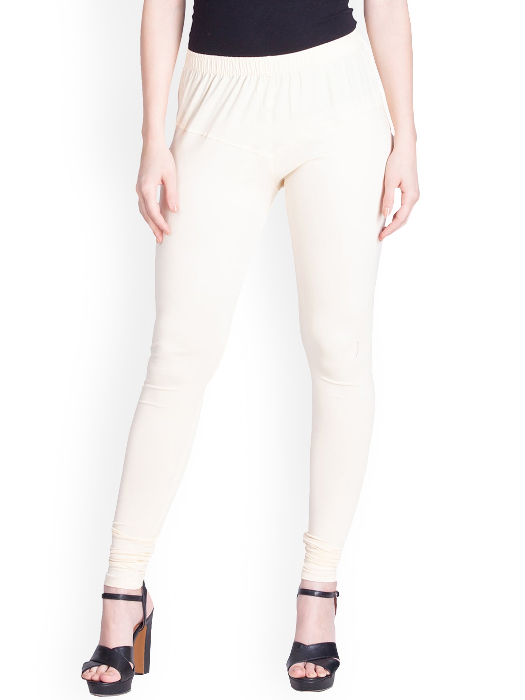 

LYRA Women Cream Solid Churidar Length Leggings