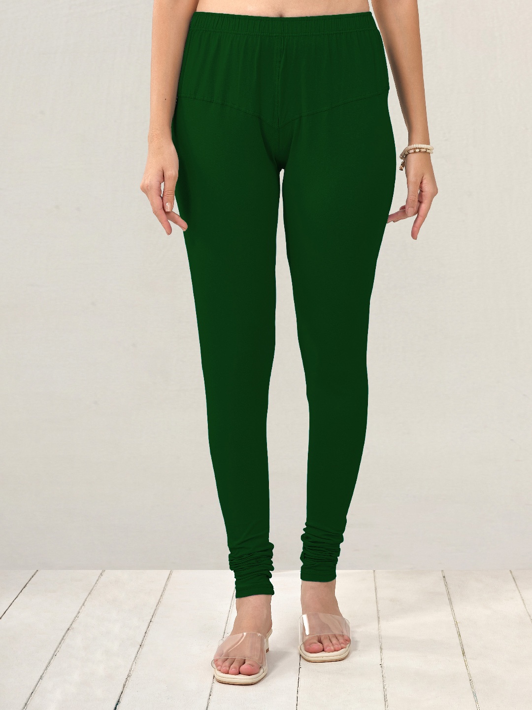 

LYRA Women Bottle Green Solid Churidar Length Leggings