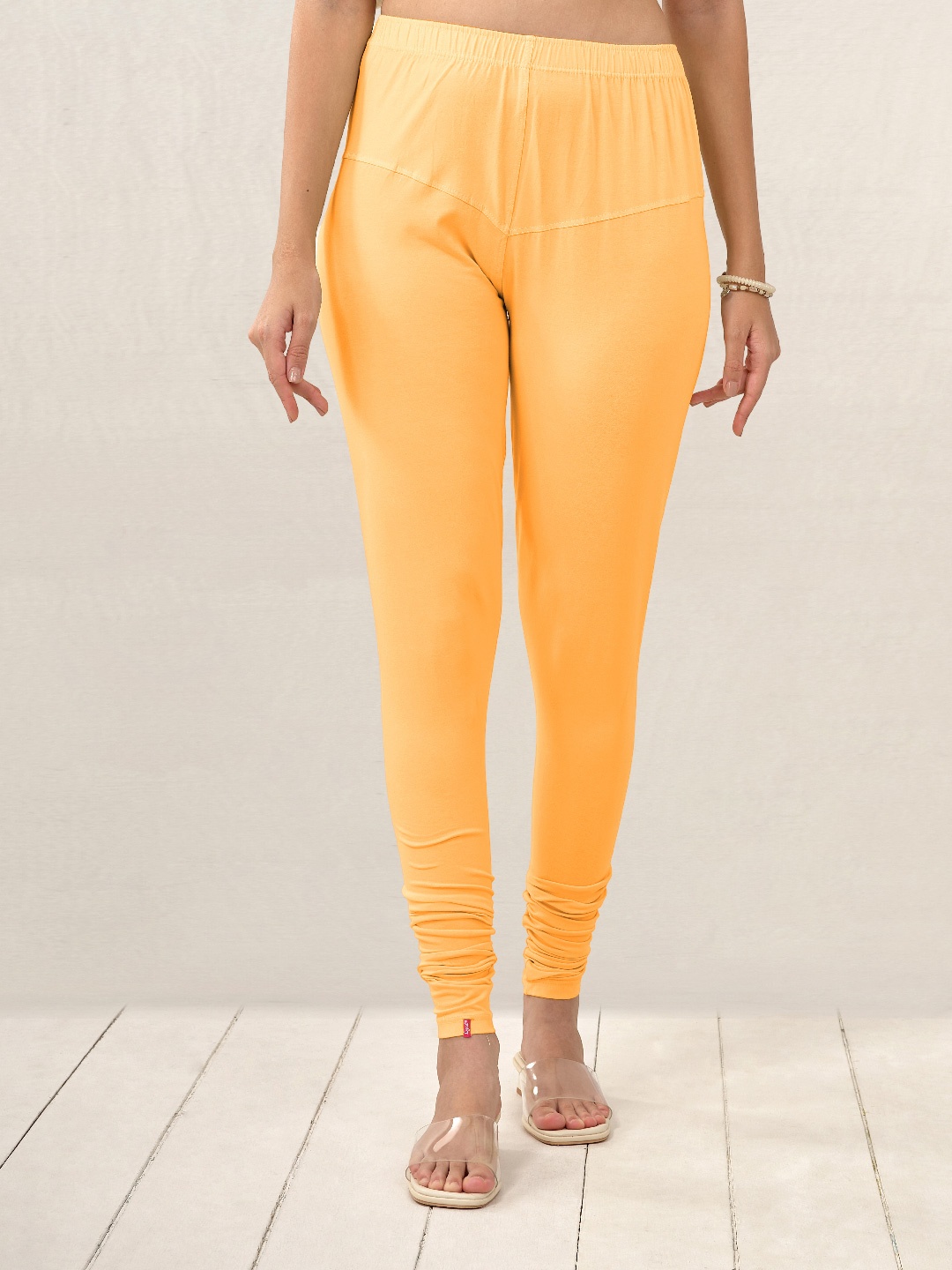 

LYRA Women Yellow Solid Churidar Length Leggings