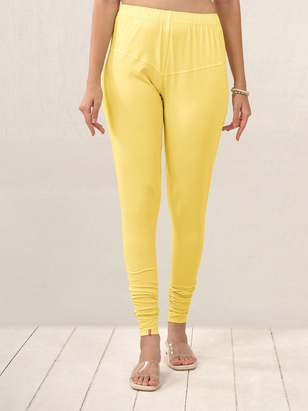

LYRA Women Yellow Solid Churidar Length Leggings