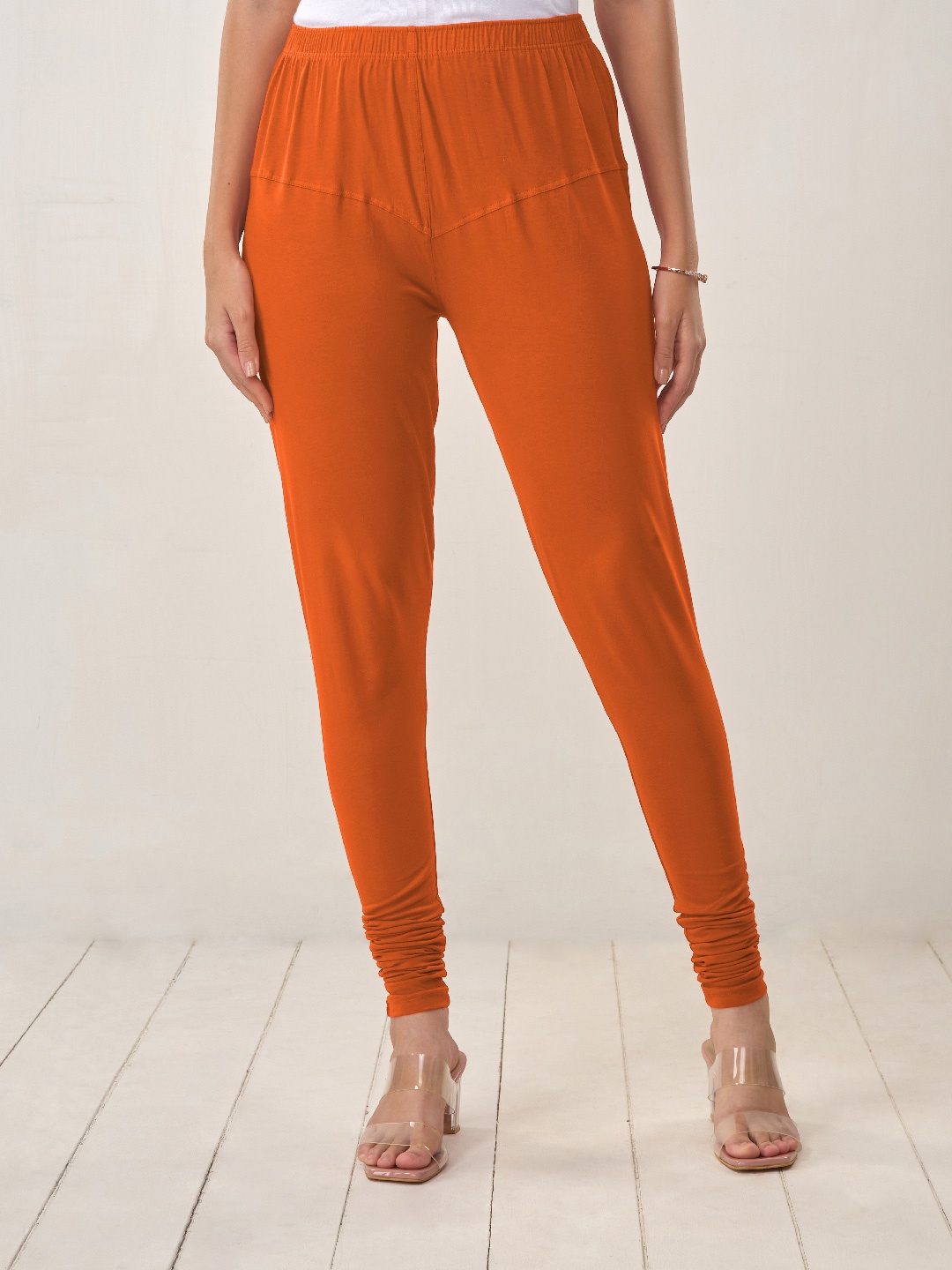 

LYRA Women Orange Solid Churidar Length Leggings