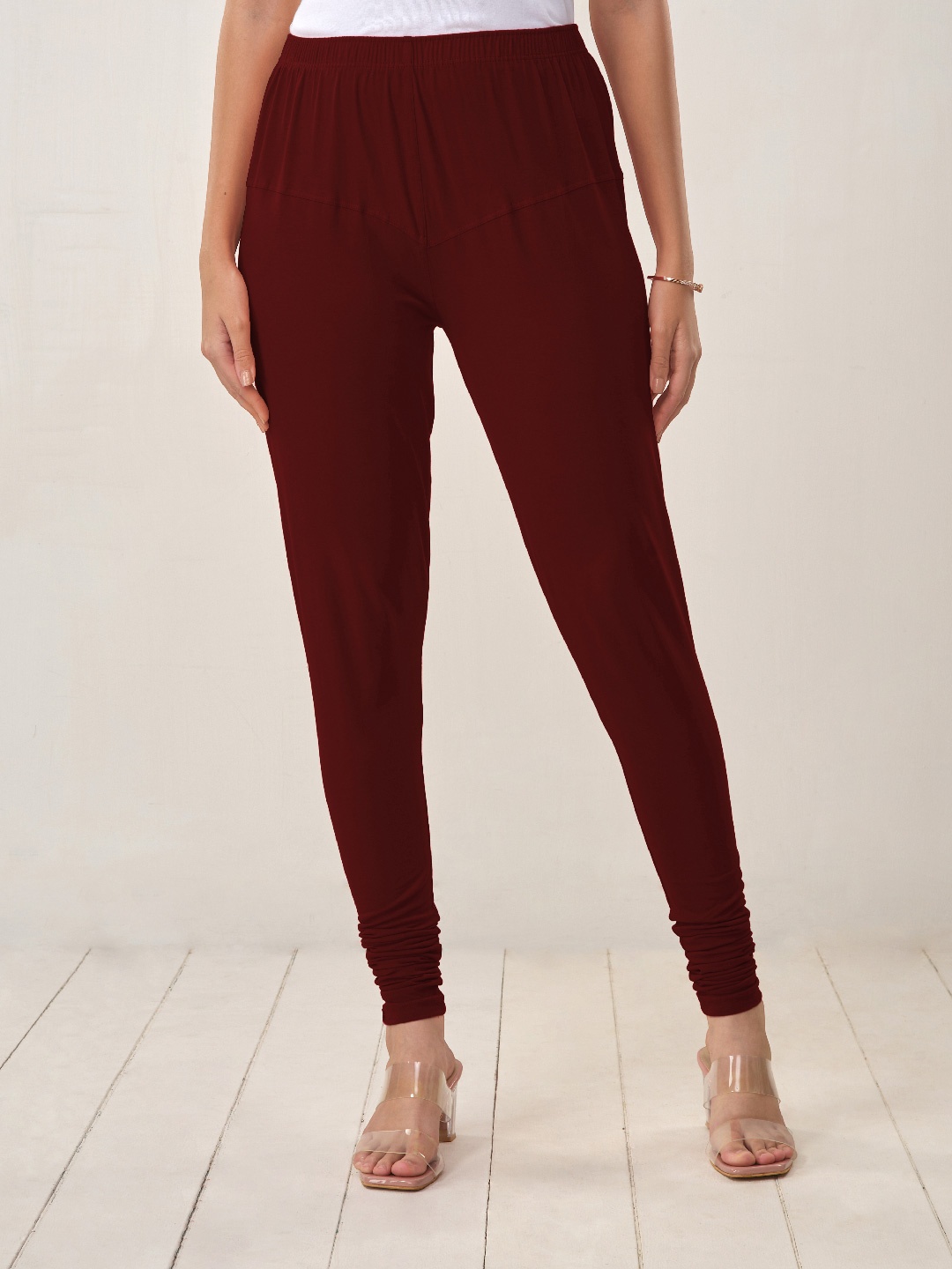 

LYRA Women Maroon Solid Churidar-Length Leggings