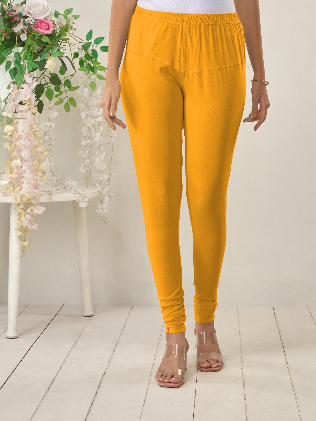 

LYRA Women Yellow Solid Churidar-Length Leggings