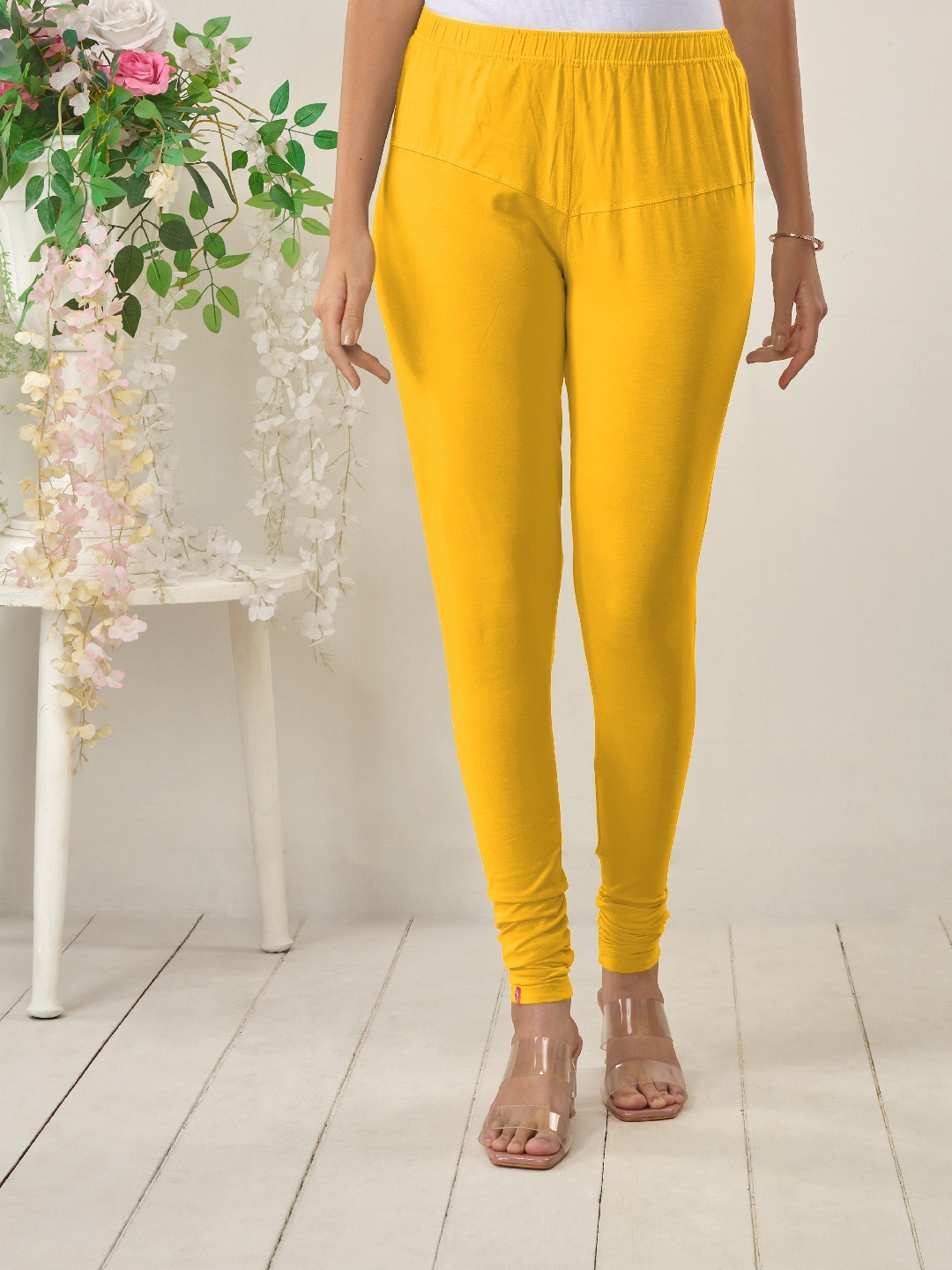 

LYRA Women Yellow Solid Churidar-Length Leggings