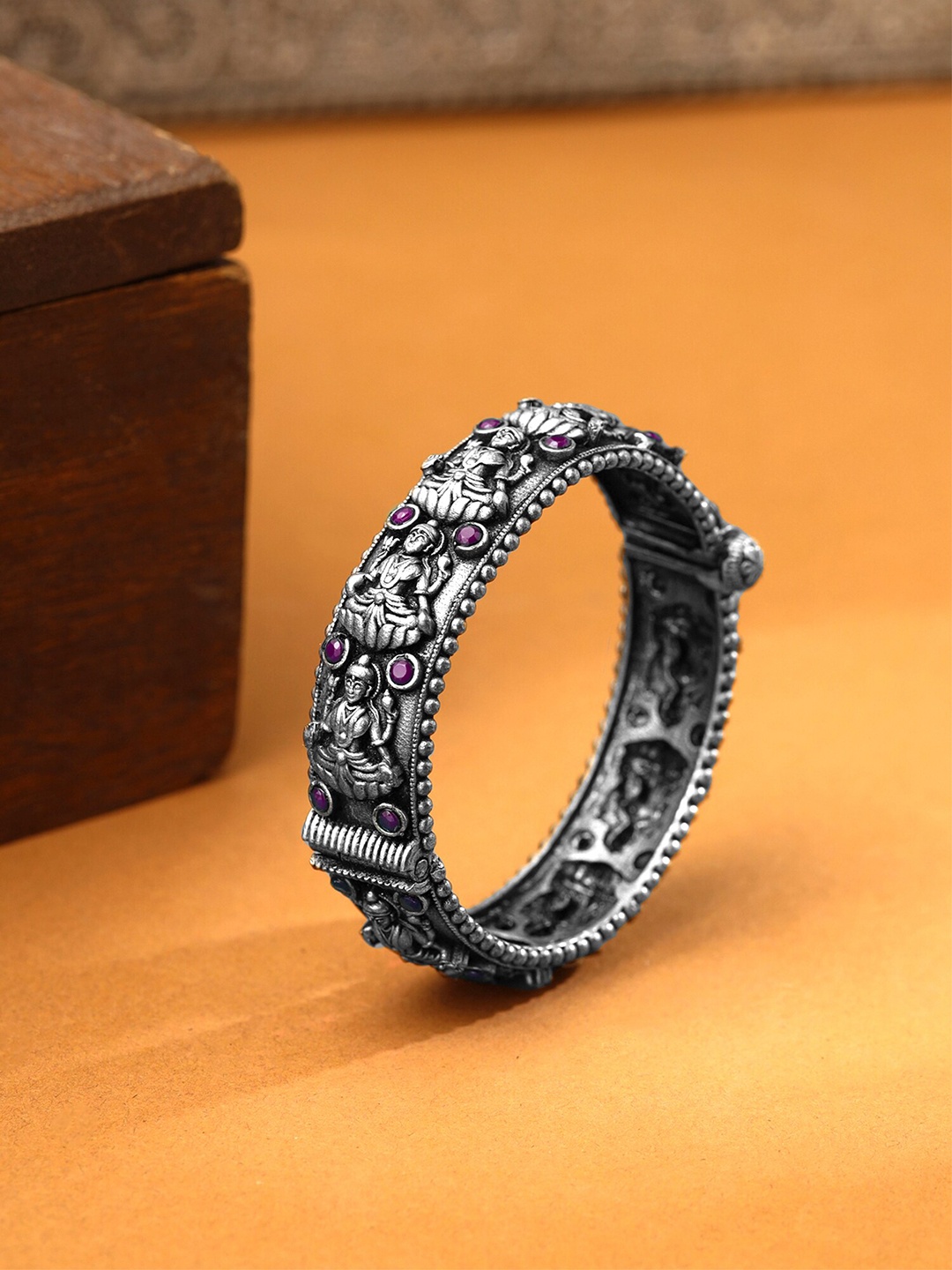 

Yellow Chimes Silver Oxidised Laxmi Designed Stone Studded Bangle