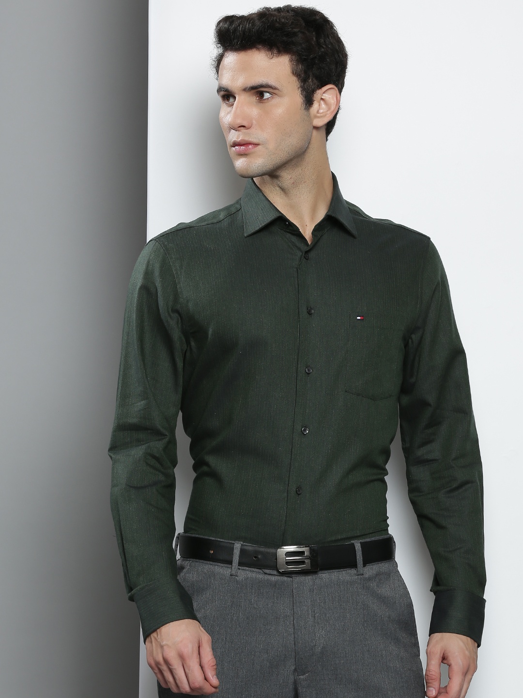 

Tommy Hilfiger Men Green Solid Formal Shirt