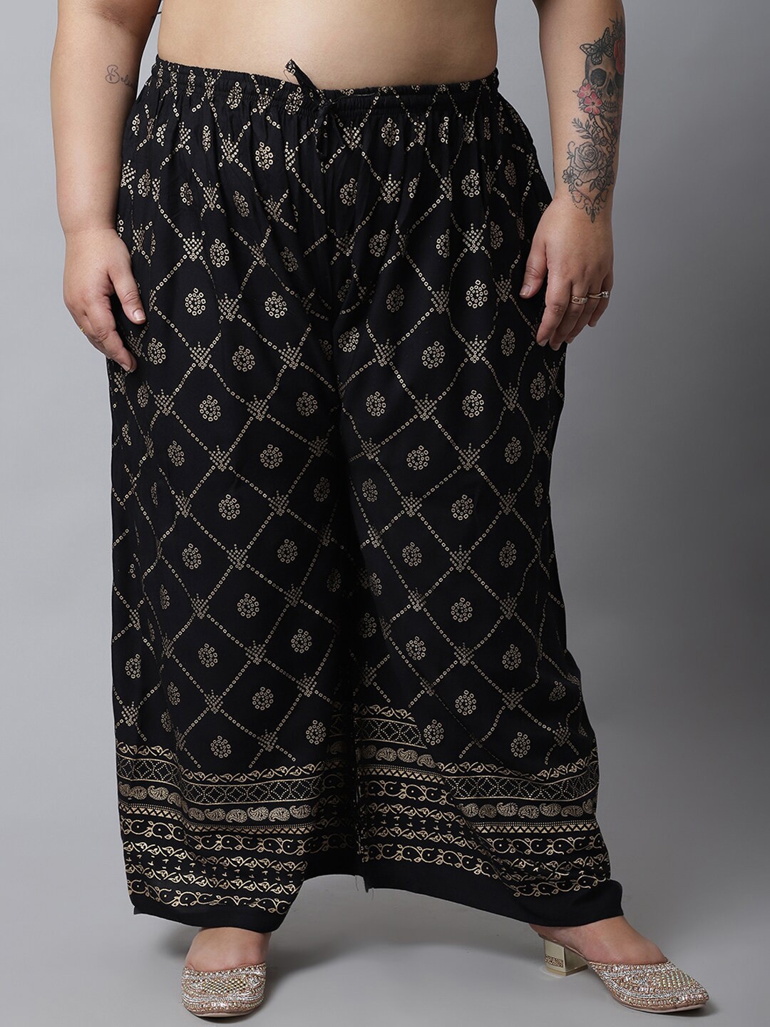 

Miaz Lifestyle Women Black & Gold-Toned Cotton Plus Size Printed Knitted Palazzos