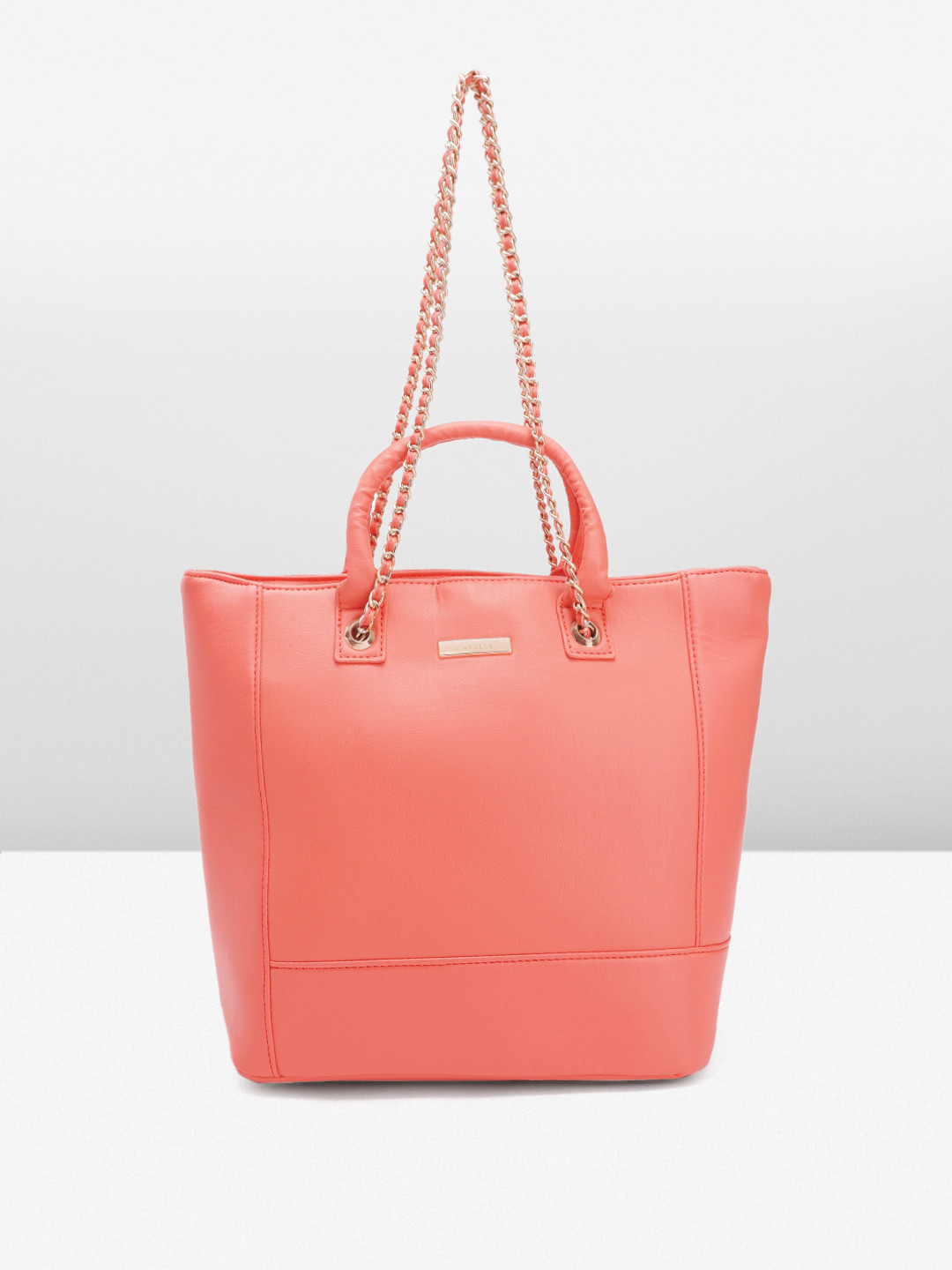 

Caprese Solid Structured Handheld Bag With Additional Handles, Coral