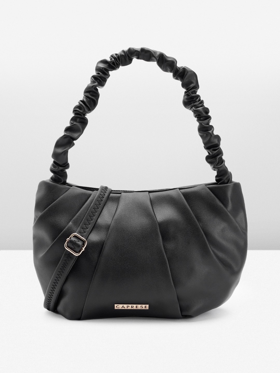 

Caprese Women Solid Handheld Bag, Black