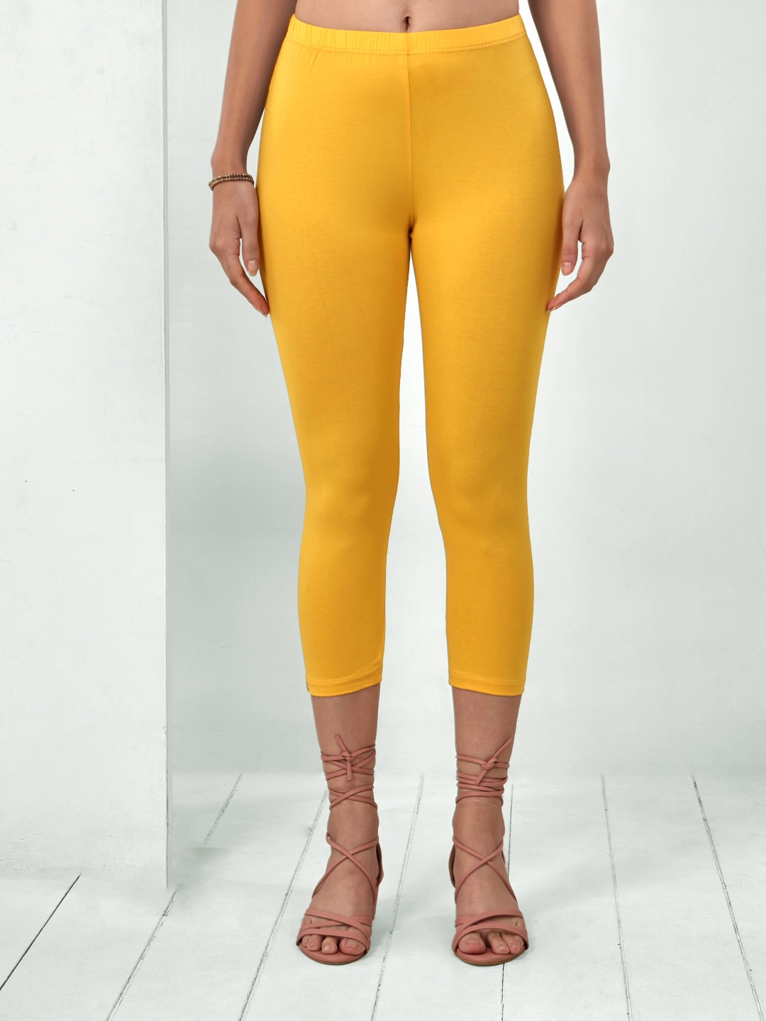 

LYRA Women Yellow Solid Cotton Regular Fit Capris