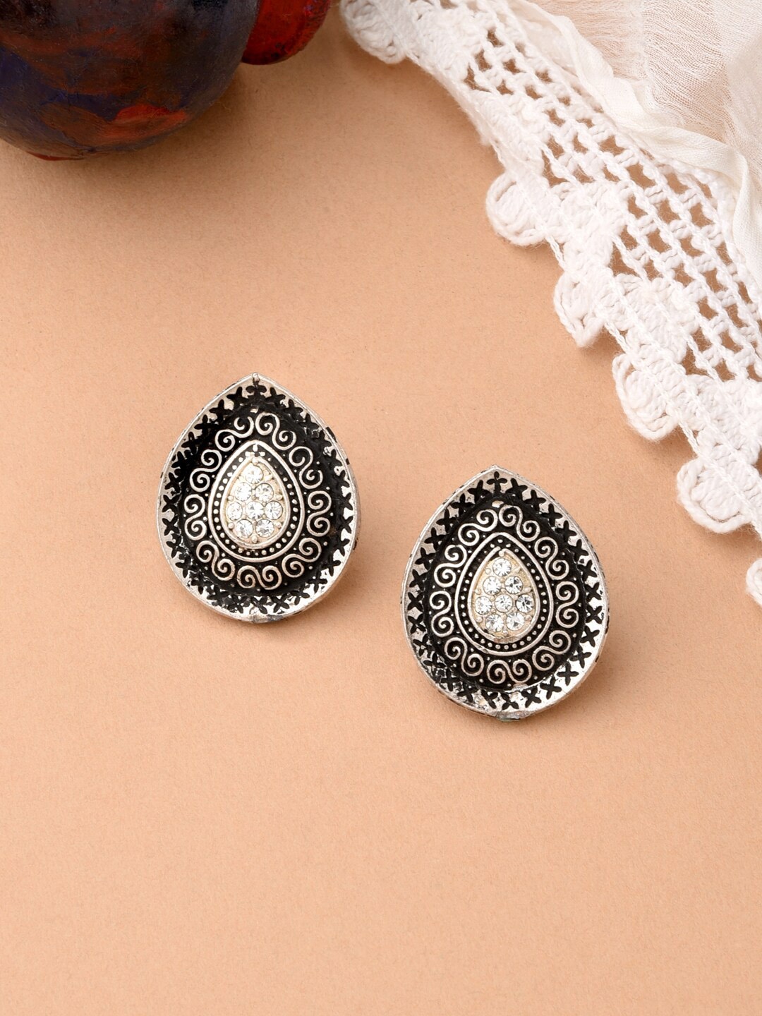 

ToniQ Silver-Toned & Black Teardrop Shaped Studs Earrings