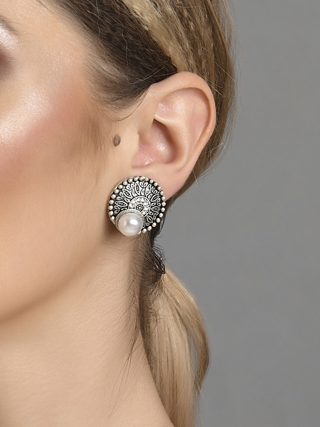 

ToniQ White Circular Studs Oxidised Earrings