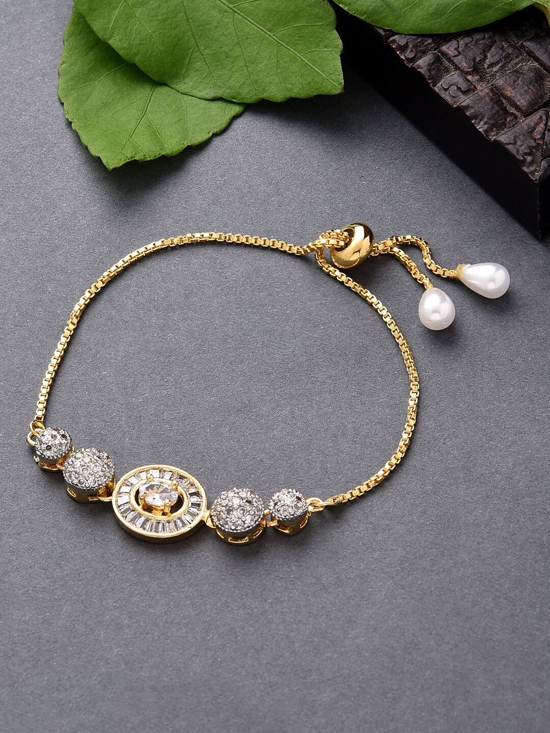 

ToniQ Women Gold-Toned & White Gold-Plated American Diamond Link Bracelet