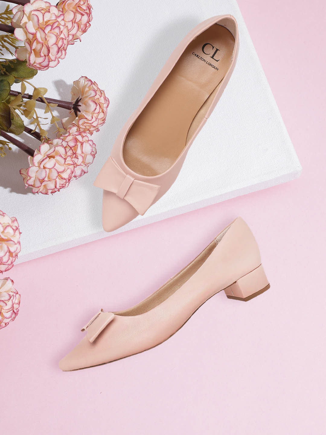 

Carlton London Women Pink Solid Block Heel Pumps with Bow Detail