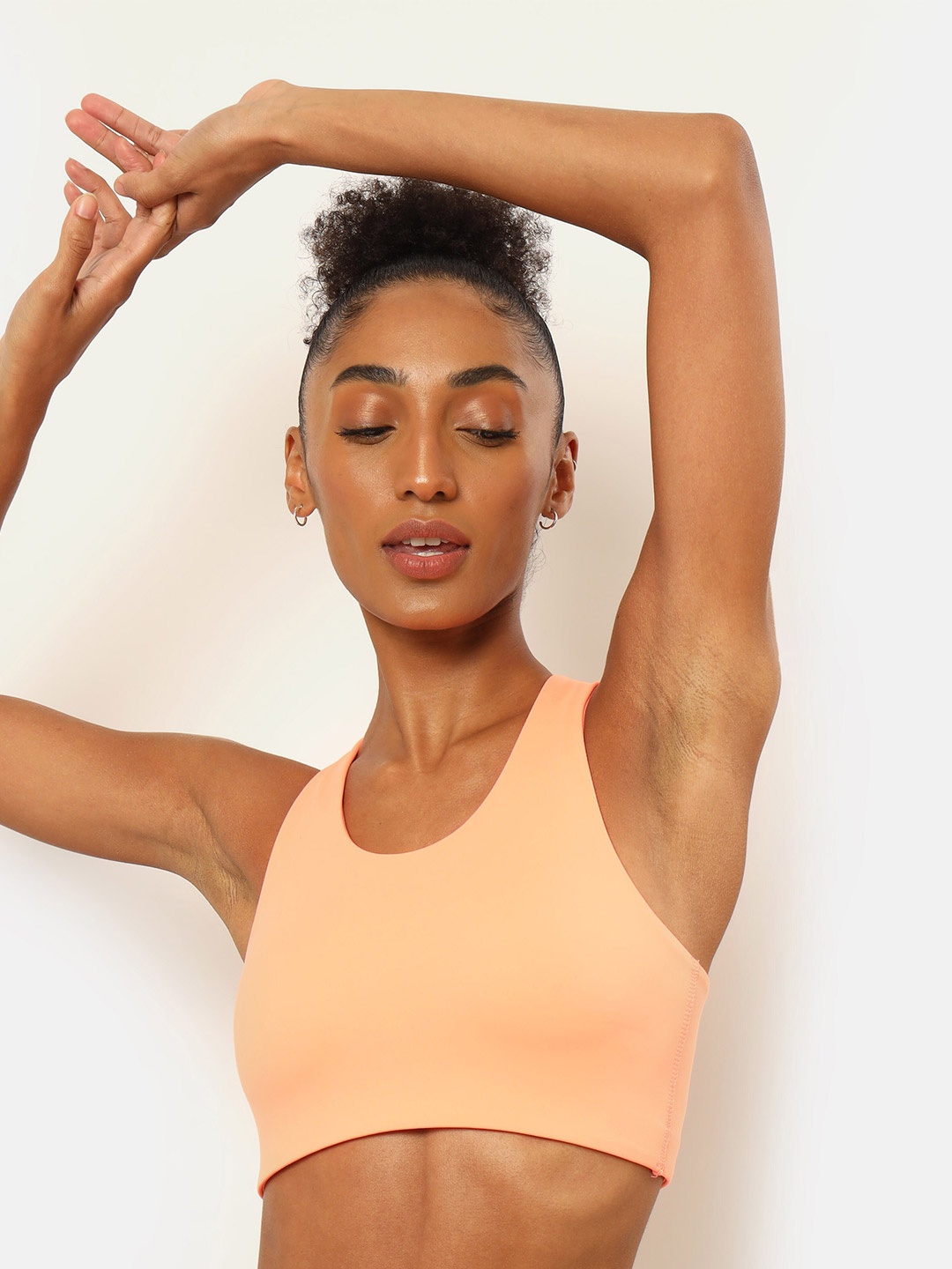 

cultsportone Peach-Coloured Essential Racerback Sports Bra 700418