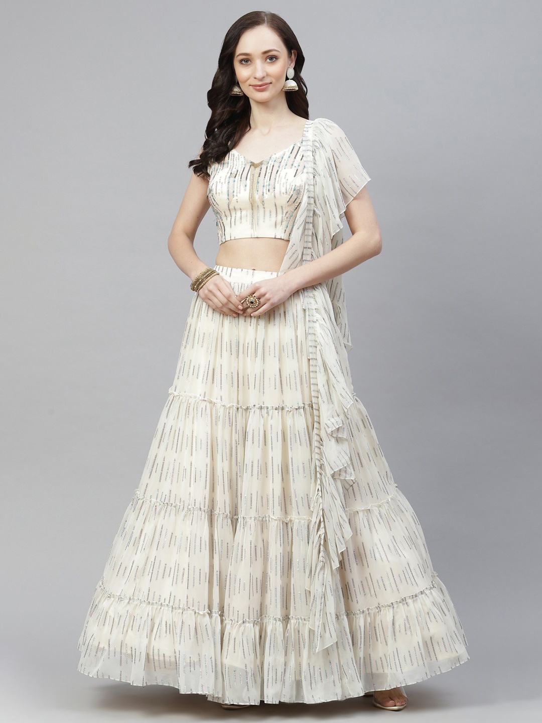 

DRESSTIVE Off White Sequinned Semi-Stitched Lehenga & Unstitched Blouse With Dupatta
