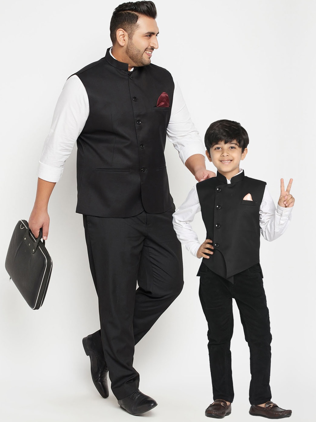 

VASTRAMAY Boys Black Solid Asymmetric Nehru Jackets