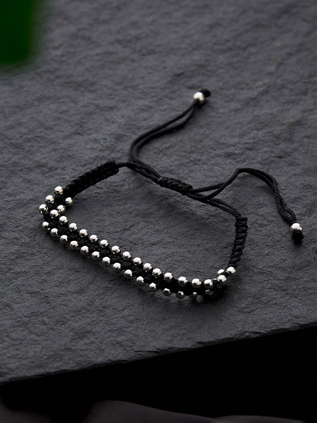 

Fabindia Women Silver-Toned & Black Silver Bracelet