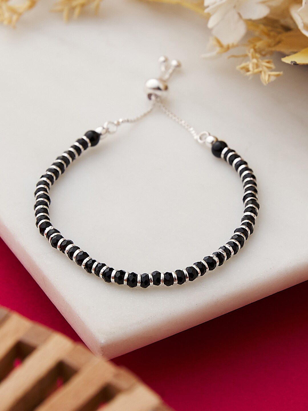 

Fabindia Women Silver-Toned & Black Bracelet