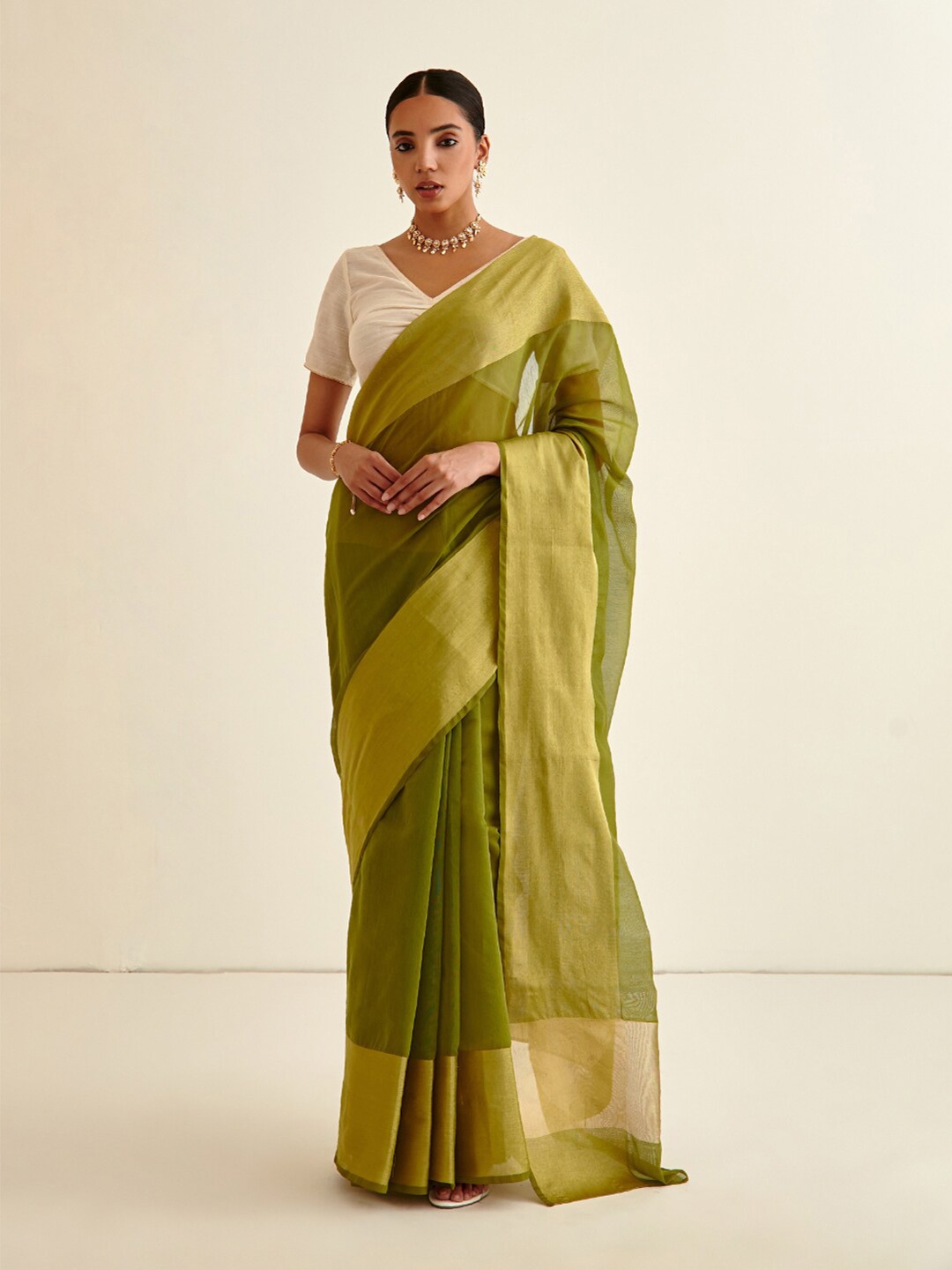 

Abhishti Olive Green & Gold-Toned Zari Banarasi Saree with Contrasting Border