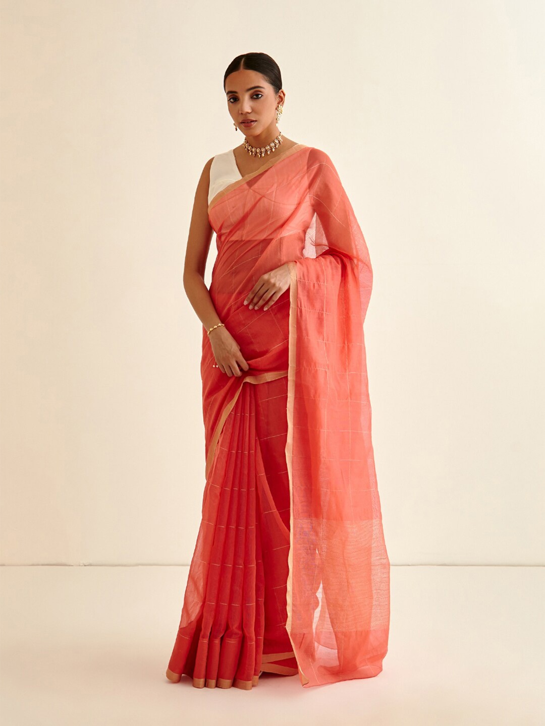 

Abhishti Peach-Coloured Checked Zari Banarasi Saree