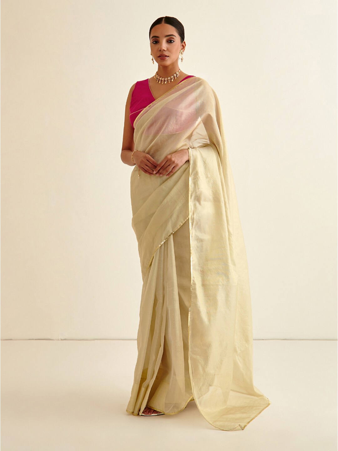 

Abhishti Gold-Toned Tissue Banarasi Saree