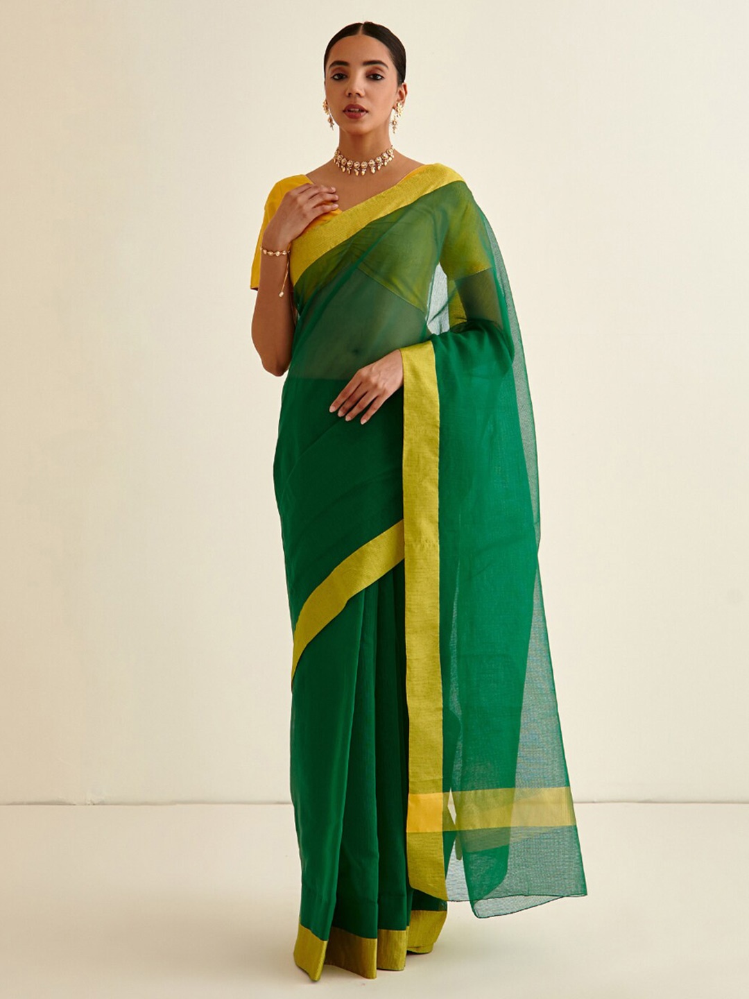 

Abhishti Green & Yellow Banarasi Saree