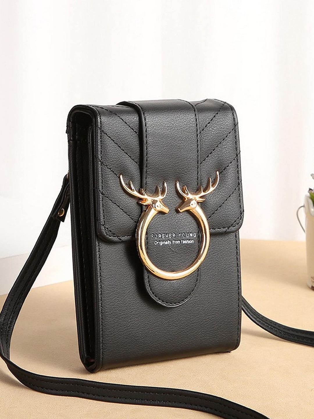 

Diva Dale Black Phone Holder Sling Bag