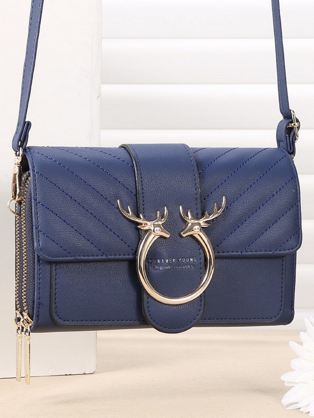 

Diva Dale Blue Phone Holder Sling Bag
