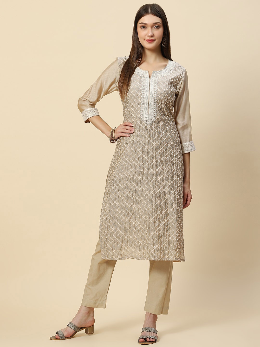 

Meena Bazaar Women Beige Embroidered Sequinned Chanderi Silk Kurta with Trouser