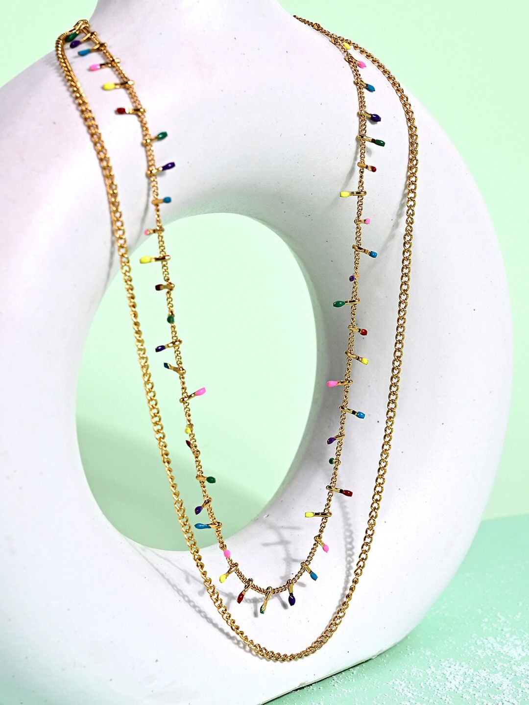 

Mikoto by FableStreet Women Gold-Toned & Red Gold-Plated Layered Necklace