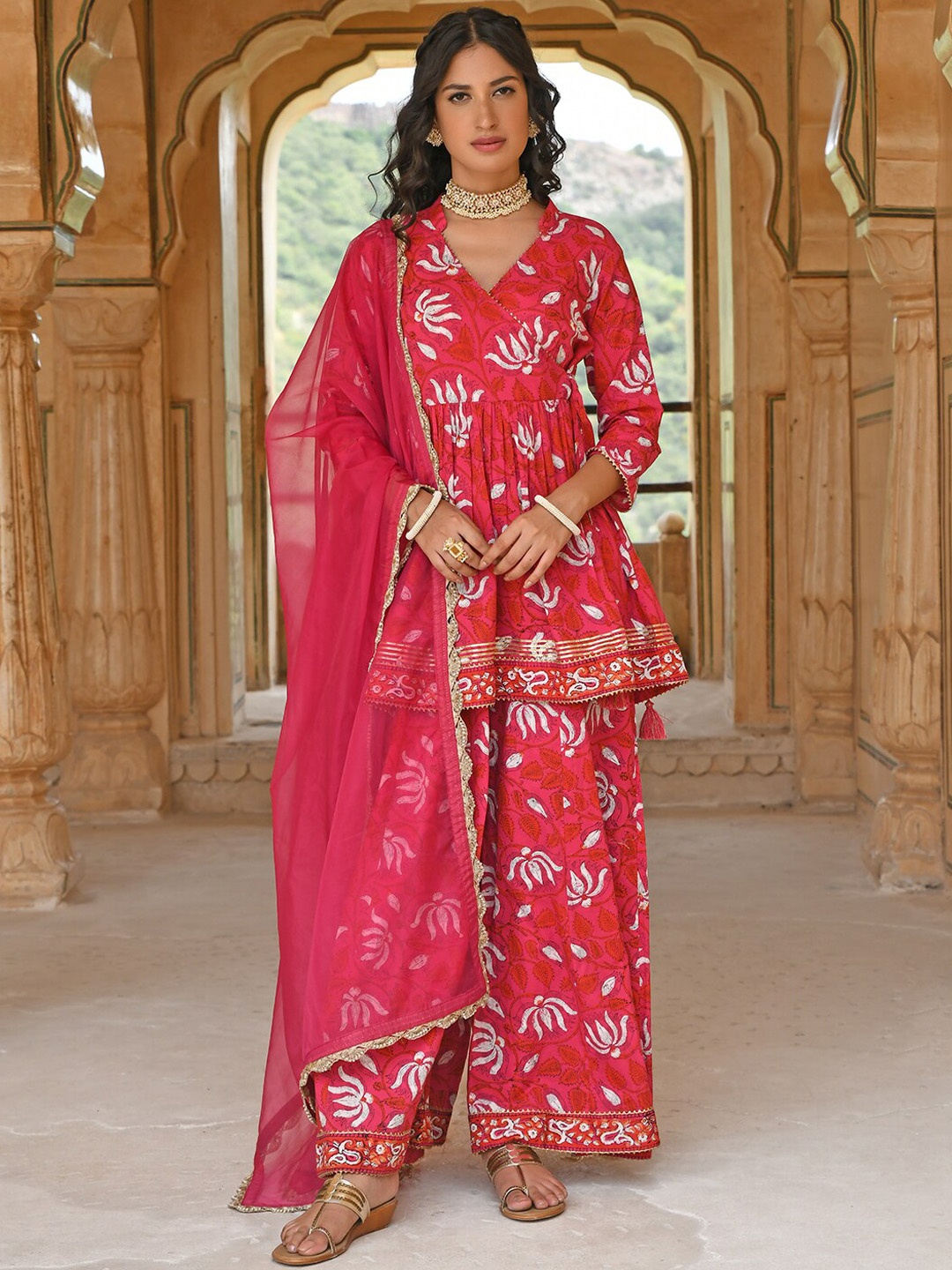 

Janasya Women Pink Cotton Floral Block Print Short Kurta With Sharara & Dupatta