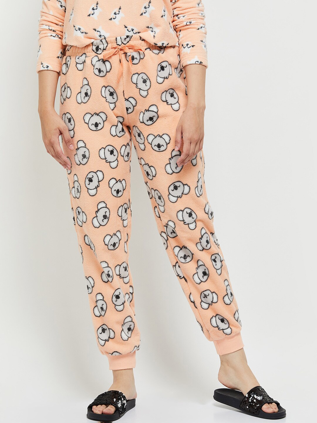 

max Women Peach Printed Fleece Lounge Pants